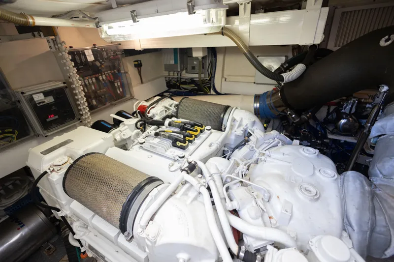 Navegante Yacht Photos Pics Engine room of 2013 Ferretti Yachts 690, showcasing mechanical components and systems.