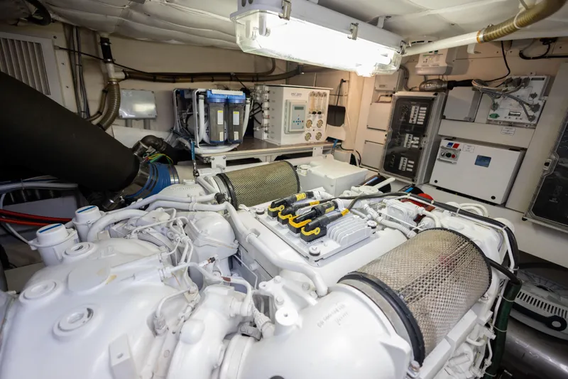 Navegante Yacht Photos Pics Engine room of 2013 Ferretti Yachts 690, showcasing mechanical components and systems.