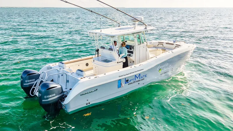 Complete Lunasea Yacht Photos Pics 2018 World Cat 320 CC boat on clear ocean water, featuring dual Yamaha engines.