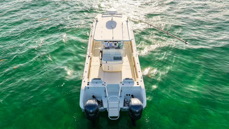 Complete Lunasea Yacht Photos Pics 2018 World Cat 320 CC boat on clear green water, viewed from above.