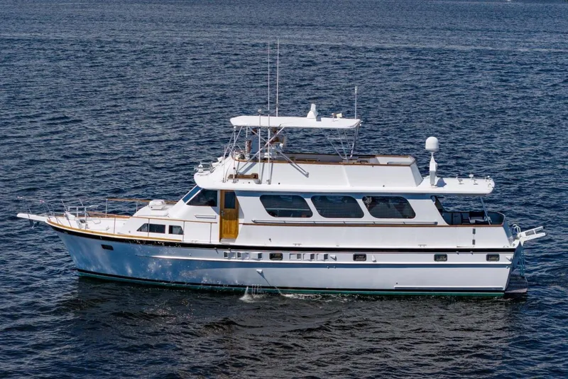 Yacht Photos Pics Classic 1971 Matthews Voyager yacht cruising on open water.