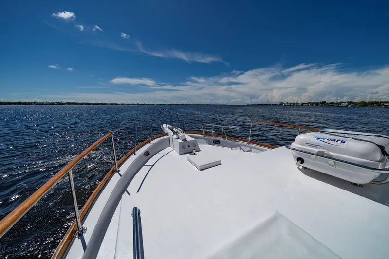  Yacht Photos Pics 1971 Matthews Voyager boat deck on open water under clear blue sky.