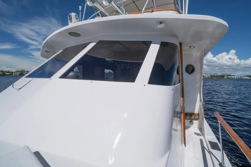  Yacht Photos Pics 1971 Matthews Voyager yacht with sleek white exterior on calm water under blue sky.
