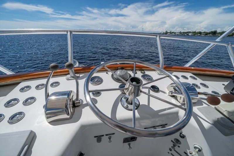 Yacht Photos Pics Steering wheel of a 1971 Matthews Voyager boat with ocean view.