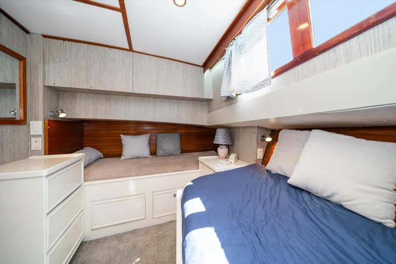  Yacht Photos Pics Cozy cabin interior of 1971 Matthews Voyager with beds, pillows, and natural light.