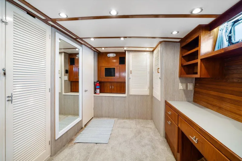  Yacht Photos Pics Luxurious interior of a 1971 Matthews Voyager yacht with wood accents and modern lighting.