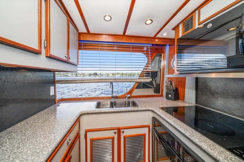  Yacht Photos Pics 1971 Matthews Voyager yacht kitchen with modern appliances and waterfront view.