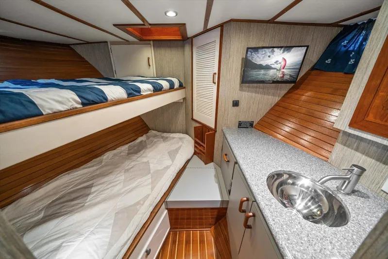  Yacht Photos Pics 1971 Matthews Voyager cabin interior with bunk beds, sink, and nautical decor.
