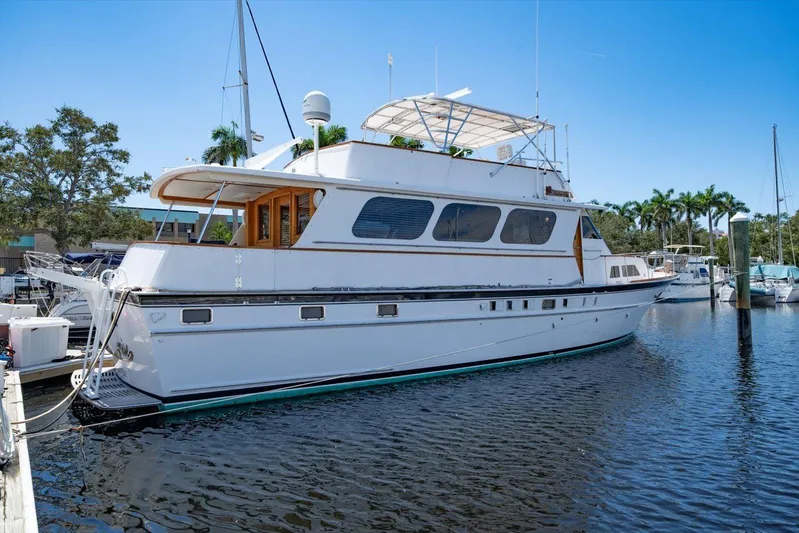  Yacht Photos Pics 1971 Matthews Voyager yacht docked in a marina under clear blue skies.