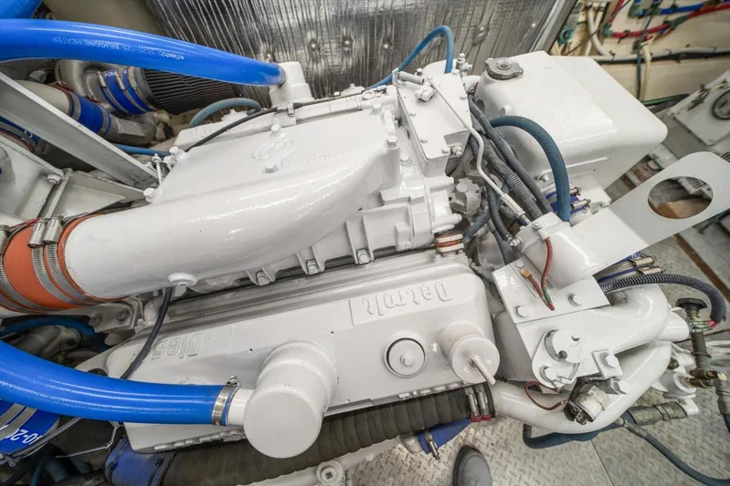  Yacht Photos Pics Engine of a 1971 Matthews Voyager with blue hoses and detailed components.