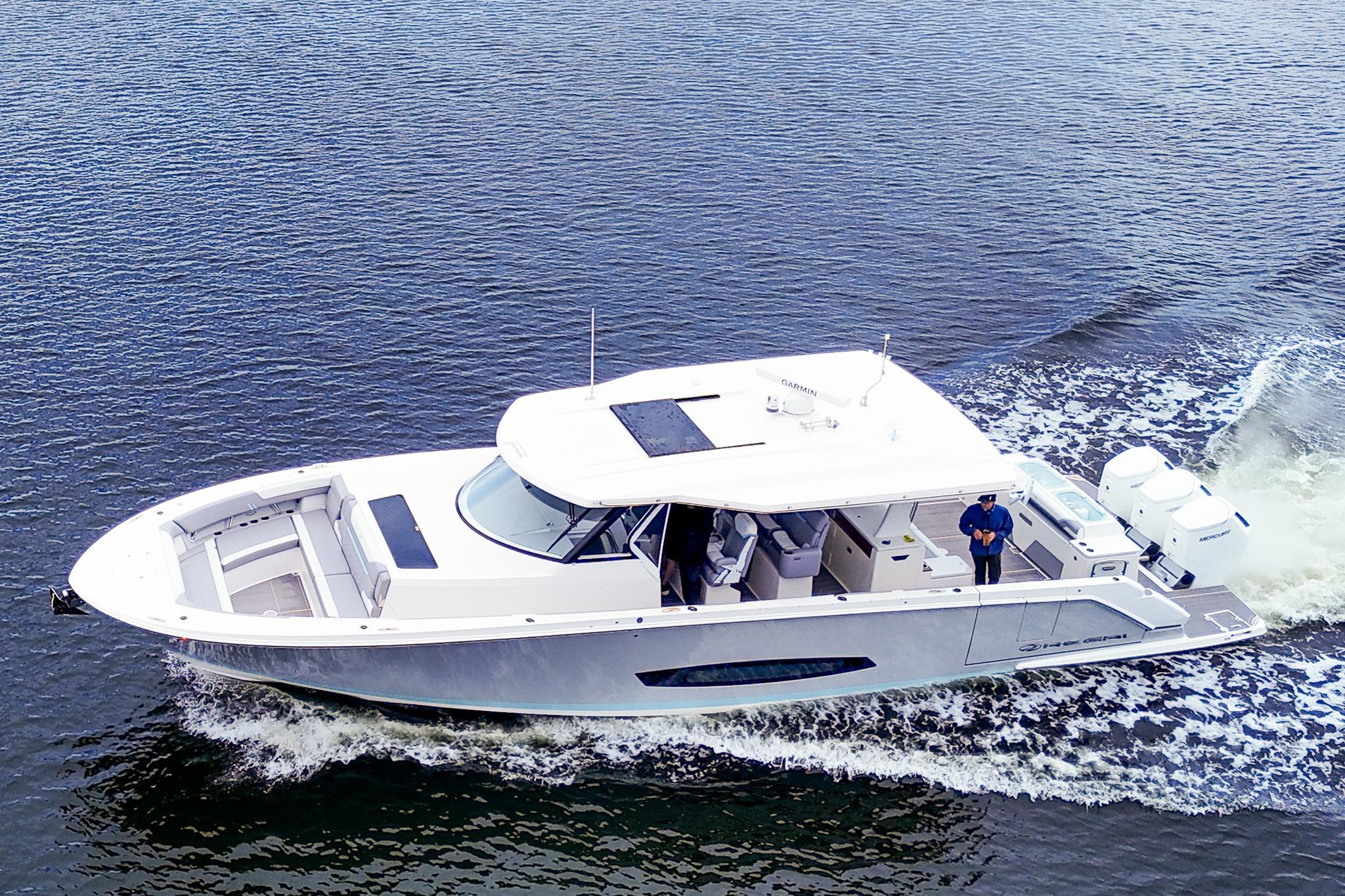 2025 Regal 50 SAV luxury yacht cruising on open water.