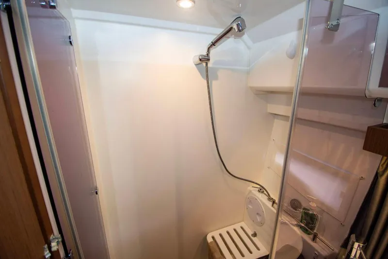 Sea Scape Yacht Photos Pics 2021 Jeanneau NC 1095 boat bathroom with shower and toilet.
