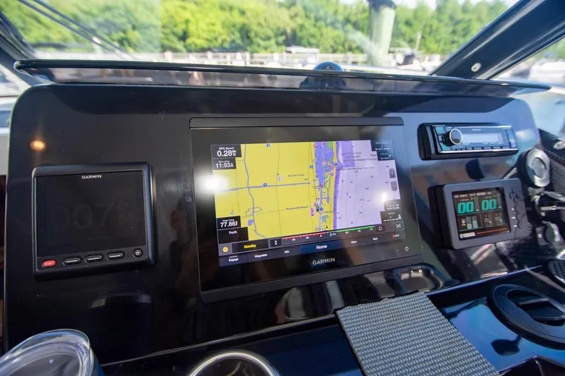 Sea Scape Yacht Photos Pics Jeanneau NC 1095 2021 dashboard with Garmin navigation system and controls.