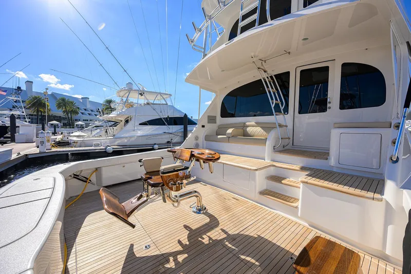 Torta Yacht Photos Pics 2017 Viking 72 Enclosed Bridge yacht with spacious deck and luxurious seating at marina.