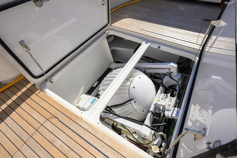 Torta Yacht Photos Pics Engine compartment of 2017 Viking 72 Enclosed Bridge yacht, showcasing mechanical components.