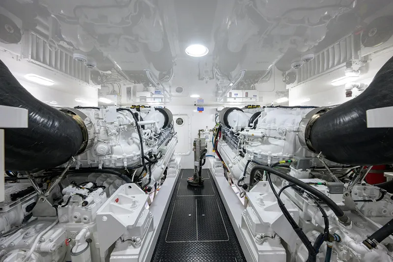 Torta Yacht Photos Pics Engine room of 2017 Viking 72 Enclosed Bridge yacht, featuring dual powerful engines.