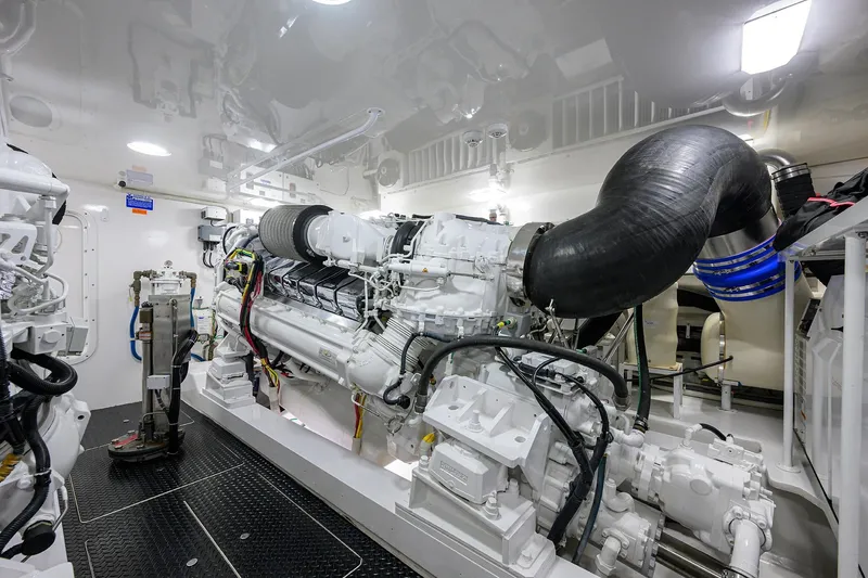 Torta Yacht Photos Pics Engine room of 2017 Viking 72 Enclosed Bridge yacht, featuring advanced machinery and equipment.