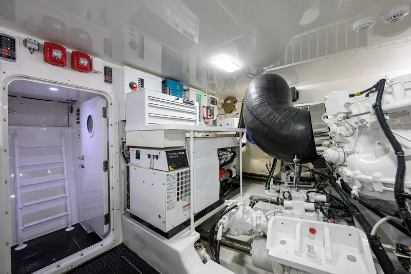 Torta Yacht Photos Pics Engine room of 2017 Viking 72 Enclosed Bridge yacht, featuring advanced machinery and equipment.