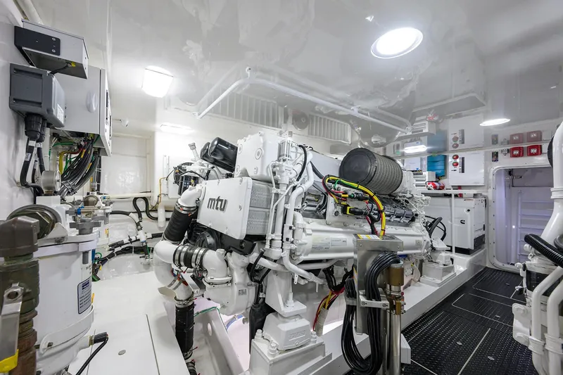 Torta Yacht Photos Pics Engine room of 2017 Viking 72 Enclosed Bridge yacht, featuring MTU machinery.