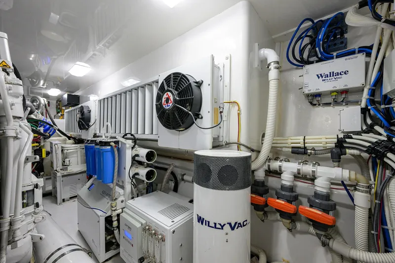 Torta Yacht Photos Pics Engine room of 2017 Viking 72 Enclosed Bridge yacht with advanced equipment and wiring.