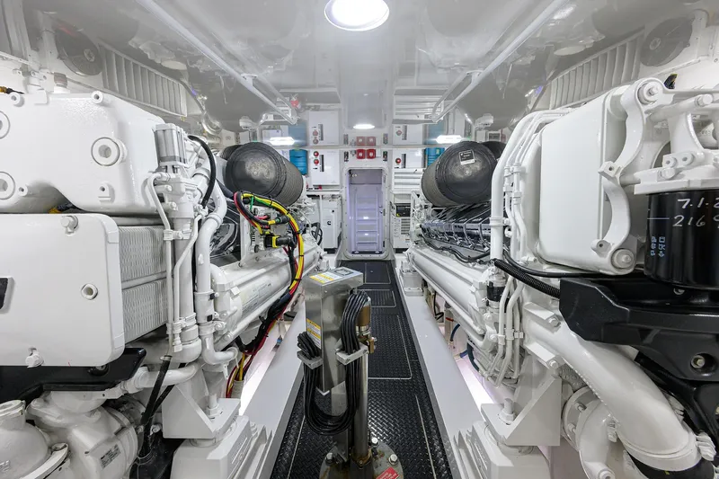 Torta Yacht Photos Pics Engine room of 2017 Viking 72 Enclosed Bridge yacht, showcasing advanced machinery and equipment.