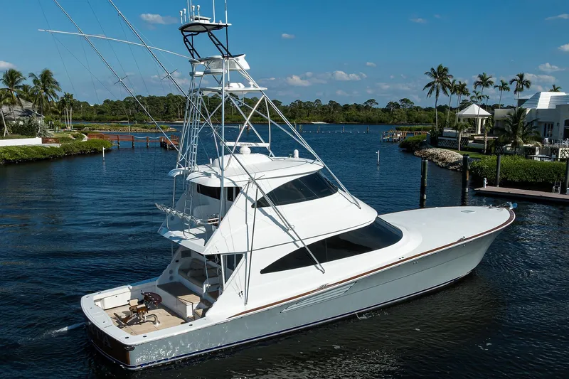 Torta Yacht Photos Pics 2017 Viking 72 Enclosed Bridge yacht cruising on a scenic waterway.