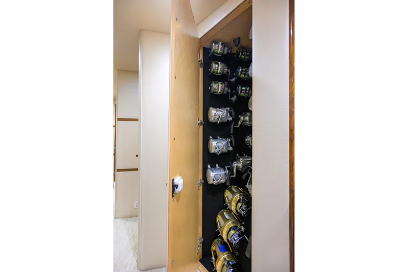 Torta Yacht Photos Pics Fishing reel storage inside 2017 Viking 72 Enclosed Bridge yacht.