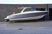 2024 Chris-Craft Launch 35GT boat displayed outdoors on a stand.