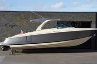 2024 Chris-Craft Launch 35GT boat displayed outdoors, featuring sleek design and modern aesthetics.