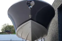 2024 Chris-Craft Launch 35GT boat, front view, sleek design, displayed outdoors.