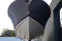 2024 Chris-Craft Launch 35GT boat, front view, displayed outdoors.