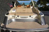 2024 Chris-Craft Launch 35GT boat with elegant seating and American flag.