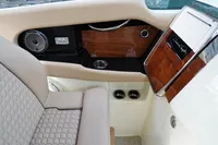 2024 Chris-Craft Launch 35GT interior with luxurious seating and elegant wood paneling.