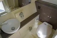 2024 Chris-Craft Launch 35GT bathroom with modern sink and toilet.
