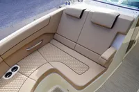 2024 Chris-Craft Launch 35GT boat with luxurious tan seating and cup holders.