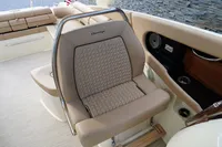 2024 Chris-Craft Launch 35GT boat interior with luxurious beige seating and modern design.