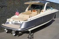 2024 Chris-Craft Launch 35GT luxury boat with sleek design and American flag.