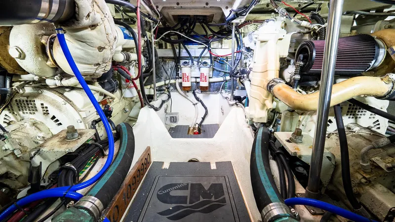 Knot On Call II Yacht Photos Pics Engine room of a 2000 Maxum 4600 SCB yacht, featuring Cummins components.