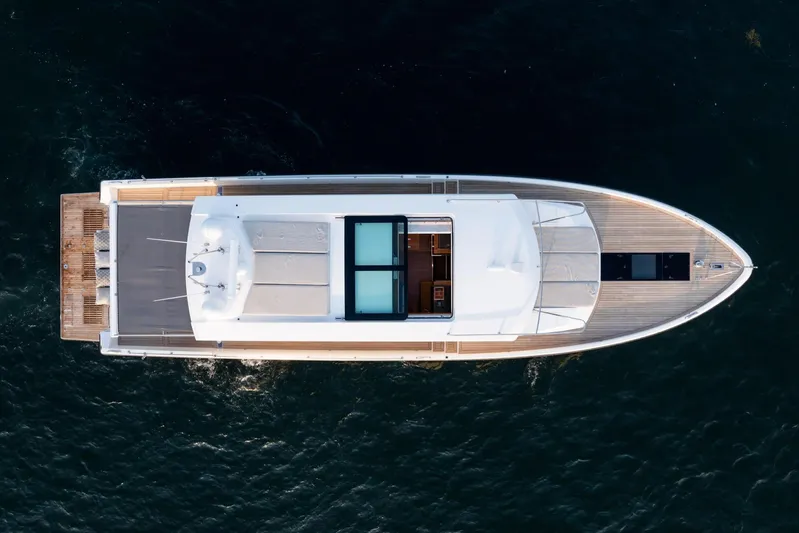  Yacht Photos Pics Overhead view of 2017 Delta Powerboats 54 IPS yacht on dark water.