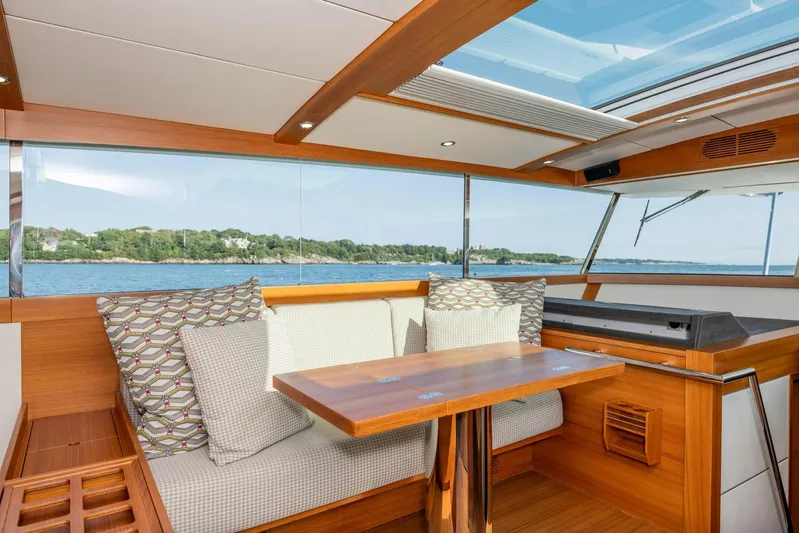  Yacht Photos Pics Luxurious interior of 2017 Delta Powerboats 54 IPS with scenic ocean view.