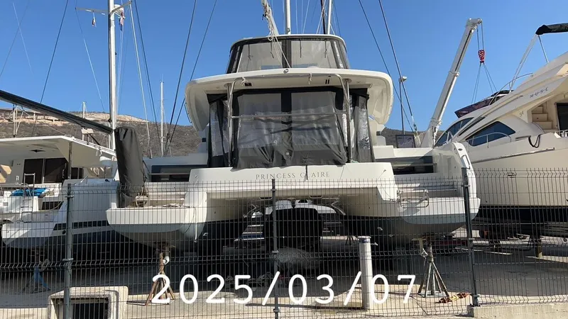  Yacht Photos Pics 2019 Lagoon LAGOON 50 catamaran docked, viewed from the rear, with date overlay "2025/03/07".