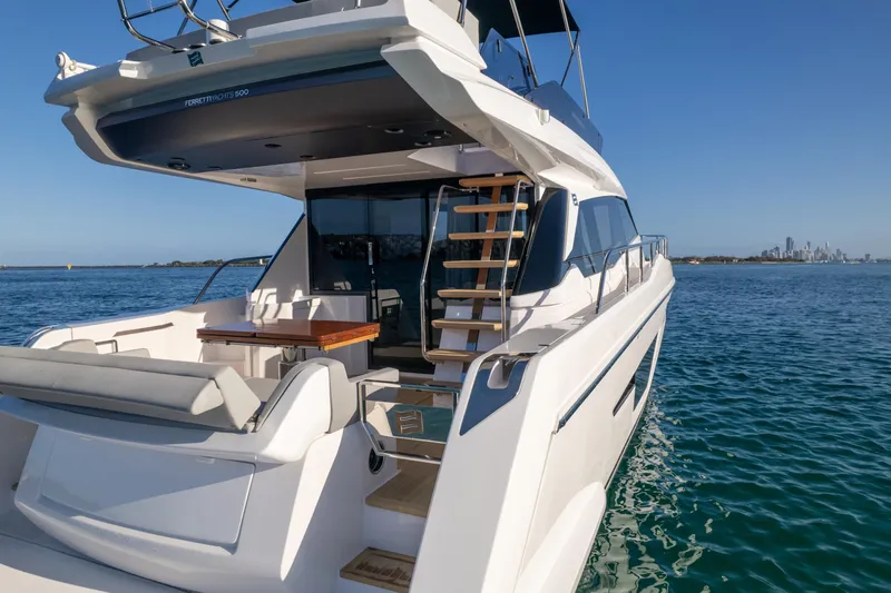  Yacht Photos Pics 2023 Ferretti Yachts 500 on water, showcasing luxury design and spacious deck.