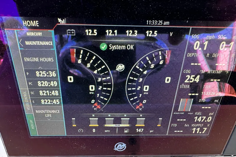  Yacht Photos Pics Digital dashboard of a 2018 Invincible 42 boat showing engine and system status.