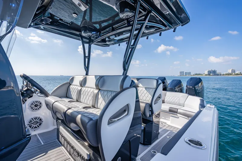  Yacht Photos Pics 2024 Nor-Tech 390 Sport Center Console boat interior with luxurious seating on open water.
