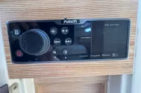 Fusion MS-AV755 audio system on 2015 Fjord 40 Open yacht, featuring Bluetooth and Pandora connectivity.