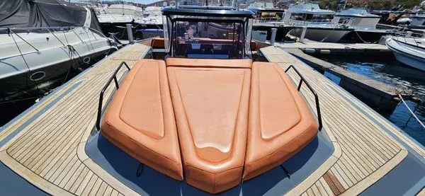  Yacht Photos Pics 2019 Sunreef 40 Open yacht with spacious deck and luxurious seating at marina.