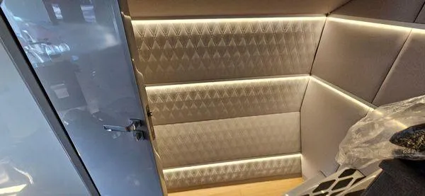  Yacht Photos Pics Luxurious interior of 2019 Sunreef 40 Open yacht with modern lighting and sleek design.