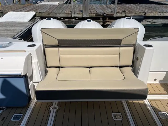  Yacht Photos Pics 2019 Pursuit DC 365 Dual Console boat with beige seating and triple outboard motors.