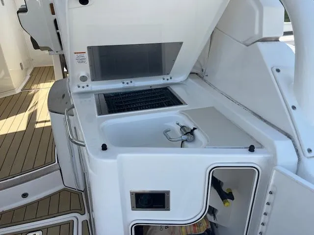  Yacht Photos Pics 2019 Pursuit DC 365 Dual Console boat with onboard kitchenette and grill.