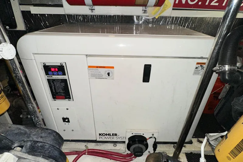 Stay The Course Yacht Photos Pics Kohler power system in 2006 Carver 43 Motor Yacht engine room.